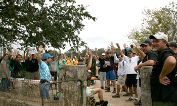 People standing outside of a Disc Golf Tournament